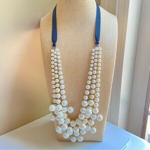 Long chunky graduated layered white faux pearl statement necklace black ribbon